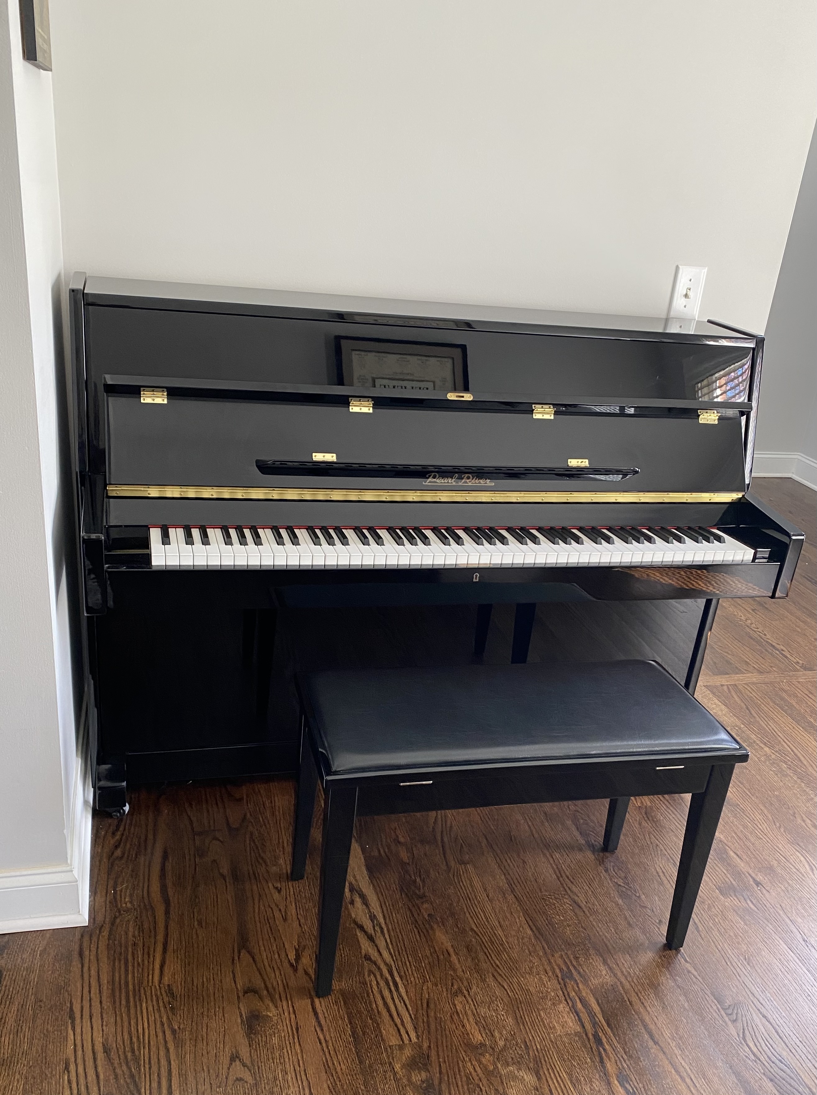 Great Piano and Bench with a Beautiful Appearance