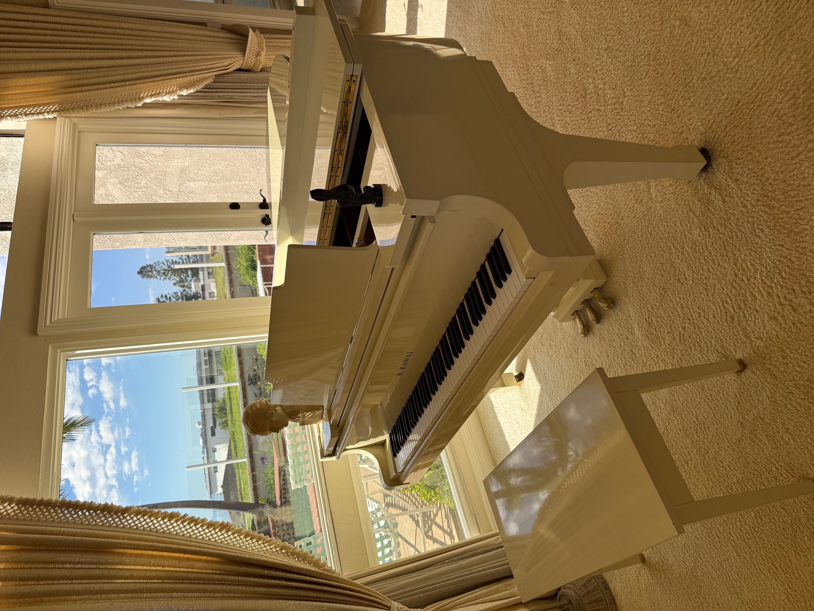 Hardly used, just tuned Kawai KG-2C white baby grand