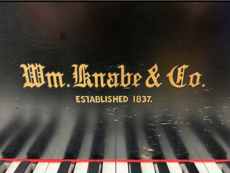 Early WM Kanabe and Co. black lacquer baby grand piano