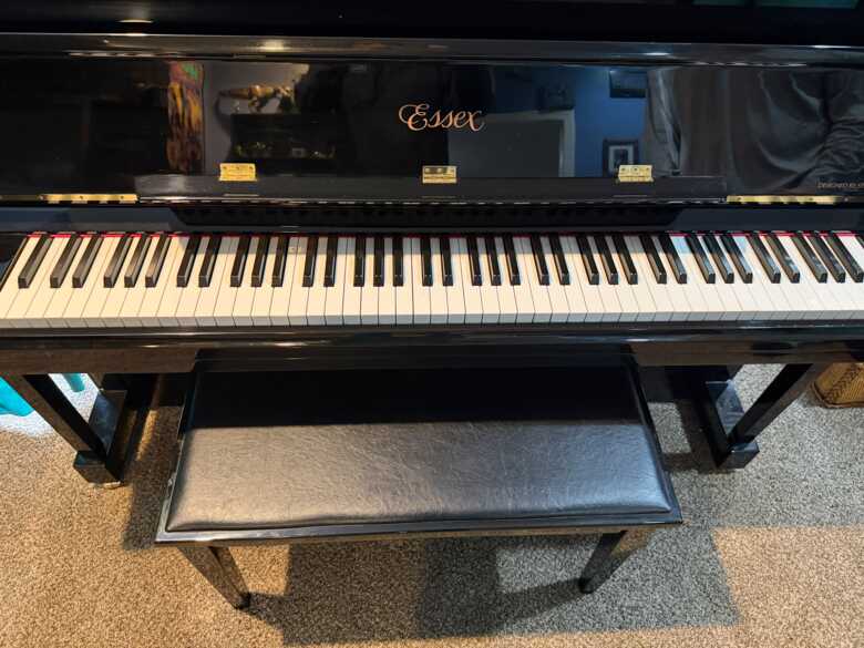 Stand up piano with streaming player system 