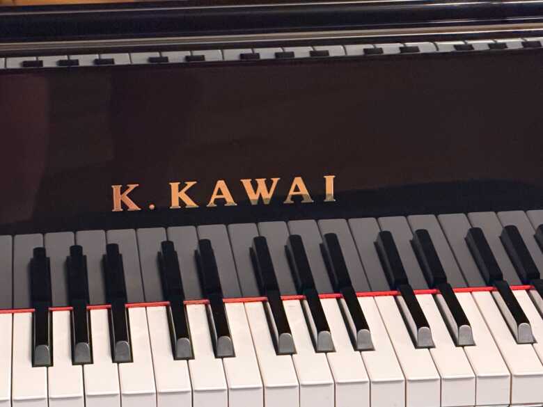 Piano-tech selling Kawai GM-10K