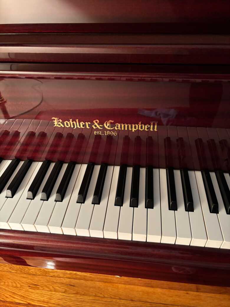 Beautiful Mahogany Gloss finish Kohler & Campbell