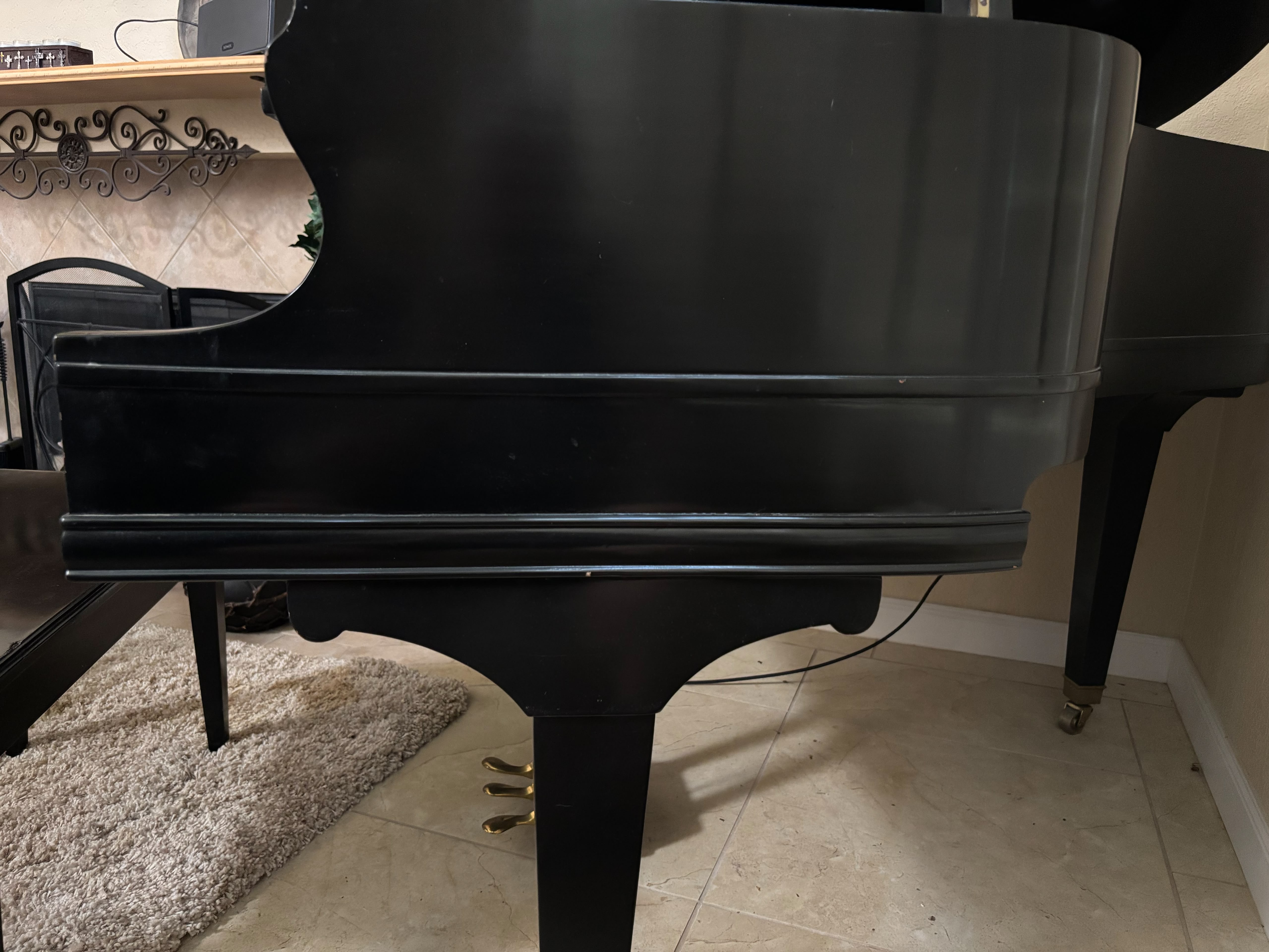 Corporation was a large manufacturer of small baby grand pia