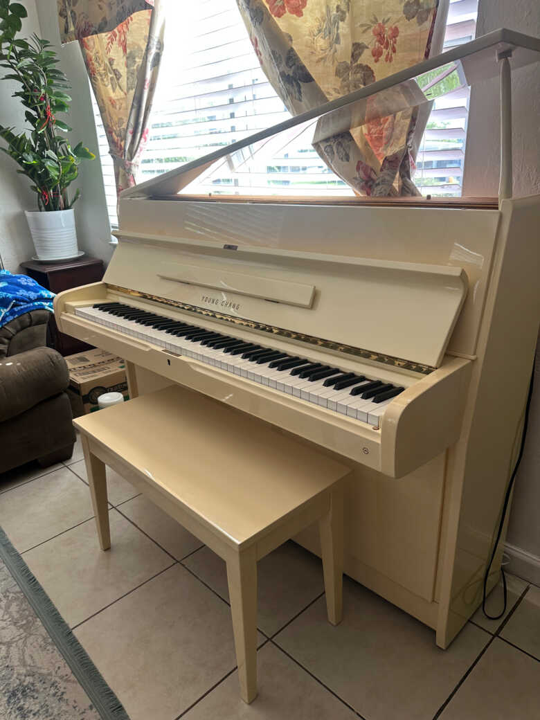 Young Chang U-107 ivory piano in great condition