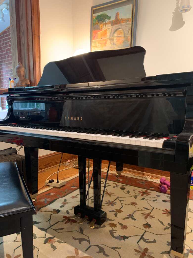 Baby grand Yamaha piano 