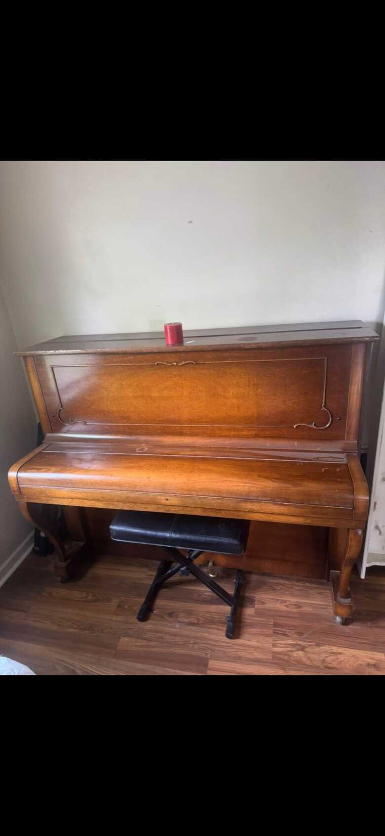 Steinways & sons upright piano in excellent condition.