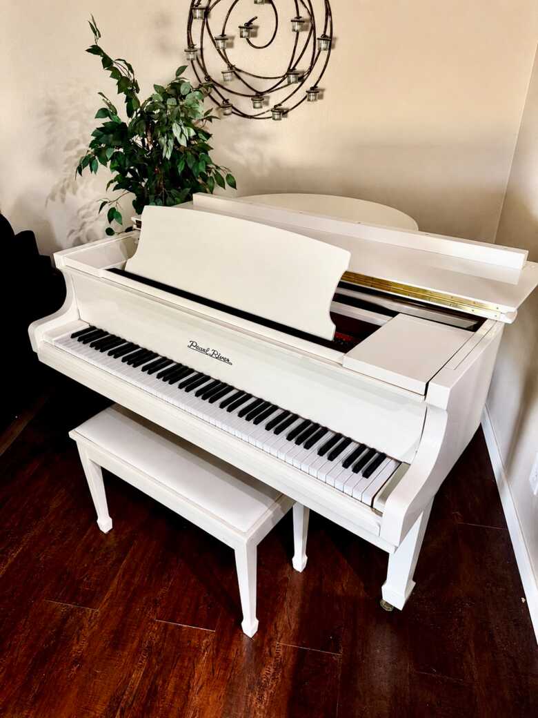 White Pearl River Baby Grand Piano 
