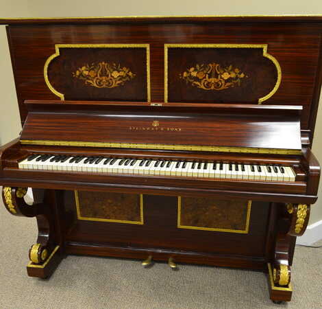 Rosewood Steinway with intricate inlays