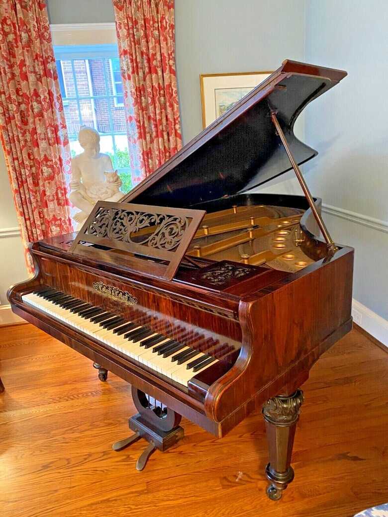 Stunning British antique grand piano