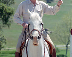 Pres_Ronald_Reagan_on_white_horse.jpg