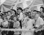 Group_Watching_Magician_Donaldsonville_LA_Fair_1938.jpg