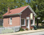 Photograph_of_a_Small_Brick_Store_on_Main_Street_in_Ste_Genevieve_MO.jpg