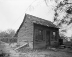 Photograph_of_1936_of_a_Cabin_Behind_the_Amoureaux_House_in_Ste_Genevieve_MO.jpg