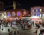 Sixth_Street__Austin__at_night.jpg