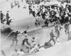 Open_battle_between_striking_teamsters_armed_with_pipes_and_the_police_in_the_streets_of_Minneapolis__06-1934_-_NARA_-_541925.jpg