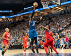 Sylvia_Fowles__34__puts_the_ball_up_as_she_s_guarded_by_Myisha_HInes-Allen__2_.jpg