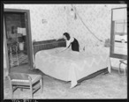 Bedroom_home_of_Alvis_New__miner_who_lives_in_company_housing_project._Adams__Rowe___Norman_Inc.__Porter_Mine..._-_NARA_-_540593.jpg