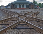 Railroad_crossover_in_Corinth__Mississippi__United_States.jpg