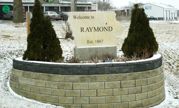 Welcome_Sign_for_Raymond__Black_Hawk_County__IA.JPG