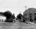 Panoramic_photograph_of_the_principal_street_of_Akron__Iowa_LCCN2007662792-cropped.jpg