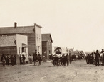 Santa_Fe_Train_passing_through_Ellsworth__Kansas__1867.__Boston_Public_Library___cropped_.jpg