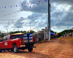 Red_truck_carrying_blue_barrels__Texas__2007_.jpg
