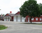 Fisher_Illinois_fire_station_and_water_tower.jpg