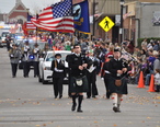 Bagpipes_lead_the_Leavenworth_County_Veterans_Day_Parade.JPG