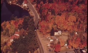 AERIAL_VIEW_OF_THE_VILLAGE_OF_INLET__NEW_YORK__TYPICAL_SMALL_ADIRONDACK_FOREST_PRESERVE_HAMLET_WITH_ONE_MAIN_STREET_-_NARA_-_554723.jpg