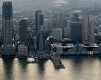 Jersey_City_skyline__Exchange_Place_waterfront_at_sunset__cropped_.jpg