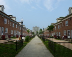 North_Common_Village__with_Saint_Jean-Baptiste_Church_in_background__Lowell__MA__2011-09-03.jpg
