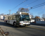 LRTA_bus_along_Stevens_Street_at_Light_Avenue__Lowell__MA__2011-12-08.JPG