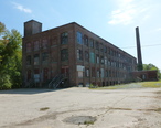 Ramahlos_West_End_Gym_at_former_Hockmeyer_family_Waterhead_Mill__north_and_west_sides__Lowell__MA__2011-09-11.JPG