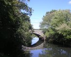 Stone_Arch_Bridge_on_Hartford_Ave__Uxbridge_MA.jpg