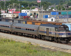Passenger_trains_and_freight_trains_at_Rigby_Yard_2005.jpg