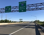 2018-07-07_18_17_50_View_south_along_Interstate_95__New_Jersey_Turnpike_Western_Spur__just_north_of_Exit_15W__Interstate_280__Newark__Kearny__in_Kearny__Hudson_County__New_Jersey.jpg