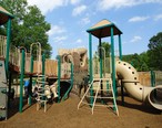 Childrens_outdoor_play_equipment_in_park.jpg