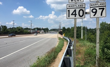 2016-08-20_13_51_15_View_north_along_Maryland_State_Route_97_and_west_along_Maryland_State_Route_140__Baltimore_Boulevard__at_Maryland_State_Route_27__Manchester_Road__in_Westminster__Carroll_County__Maryland.jpg