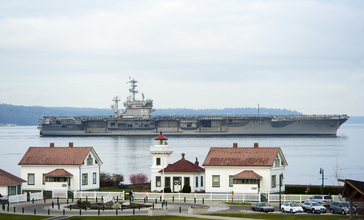 USS_Nimitz_arrives_at_homeport.__11422215434_.jpg