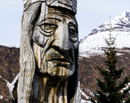 Totem_in_Valdez__Alaska_with_mountain_background.jpg