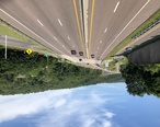 2019-07-14_10_23_18_View_west_along_Interstate_68_and_U.S._Route_40__National_Freeway__at_its_interchange_with_U.S._Route_220_from_the_overpass_for_Fletcher_Drive_in_Cumberland__Allegany_County__Maryland.jpg