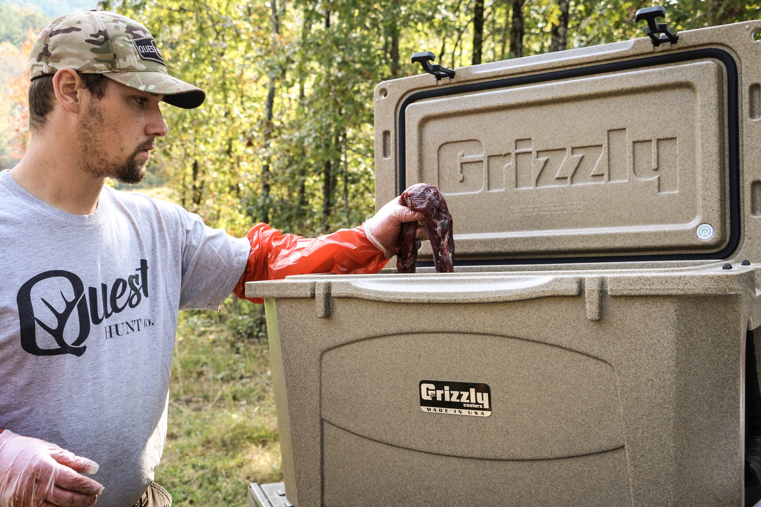 Quest member using a Grizzly cooler for hunting