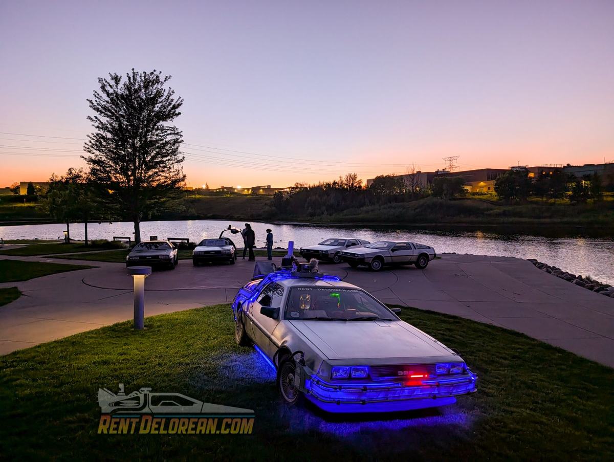 DeLoreans photographed at night at the Maple Grove screening