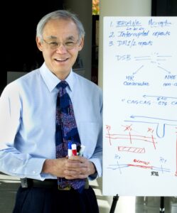 Gilbert Chu (wearing a genome tie) with his portable classroom giving office hours for medical students. Chu is a 1988 Rita Allen Foundation Scholar and a Professor of Medicine and Biochemistry at Stanford University School of Medicine. (Photo: Courtesy of Gilbert Chu)