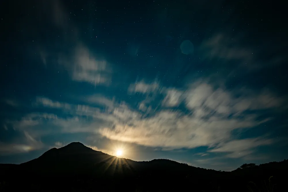 Moonrise Through the Cloud Veil