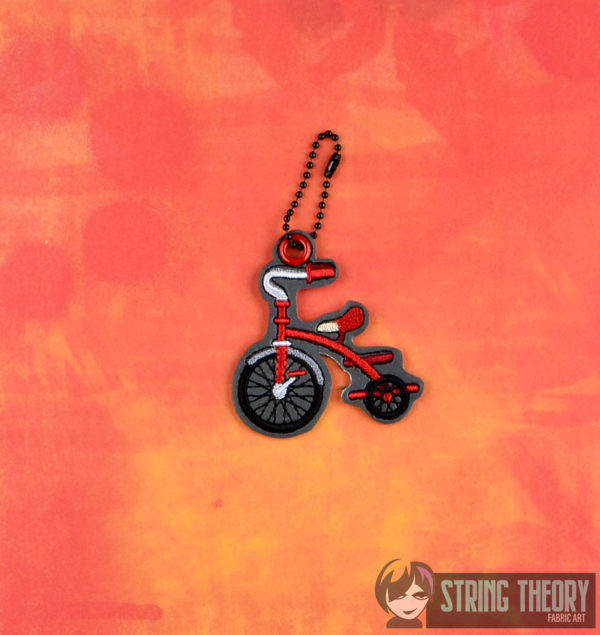 Puzzle Killer Tricycle Dangle - Image 2