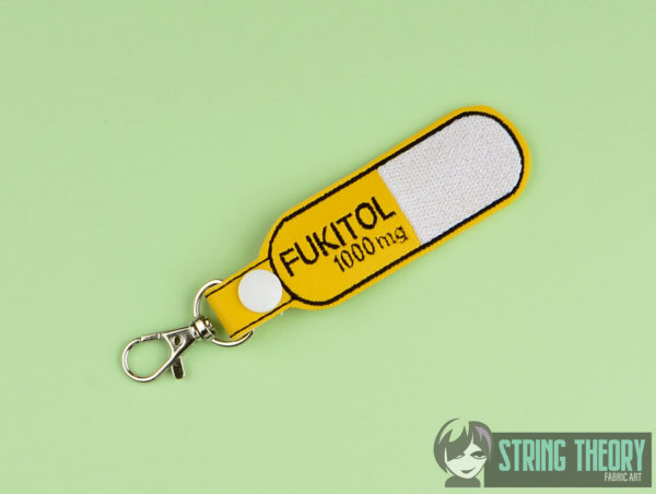 Fukitol Pill Snap Tab Key Fob