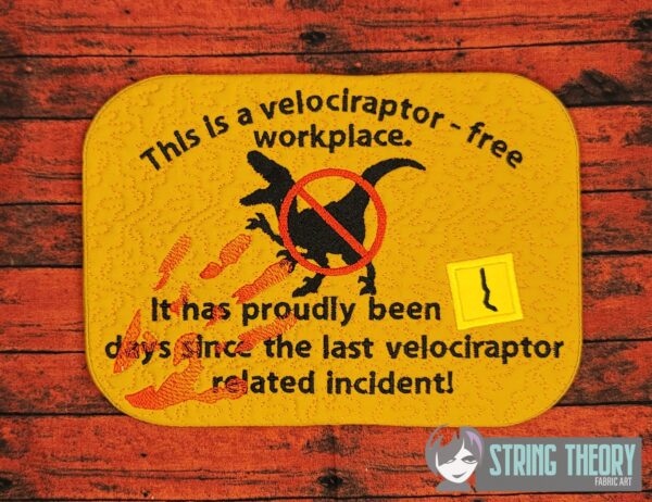 This is a Velociraptor Free Workplace Mug Rug - Image 3