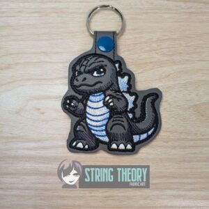 Chibi Kaiju Godzilla ITH snap tab key fob machine embroidery design