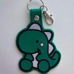 Baby Stegosaurus Dinosaur Fob in the hoop Machine Embroidery Pattern